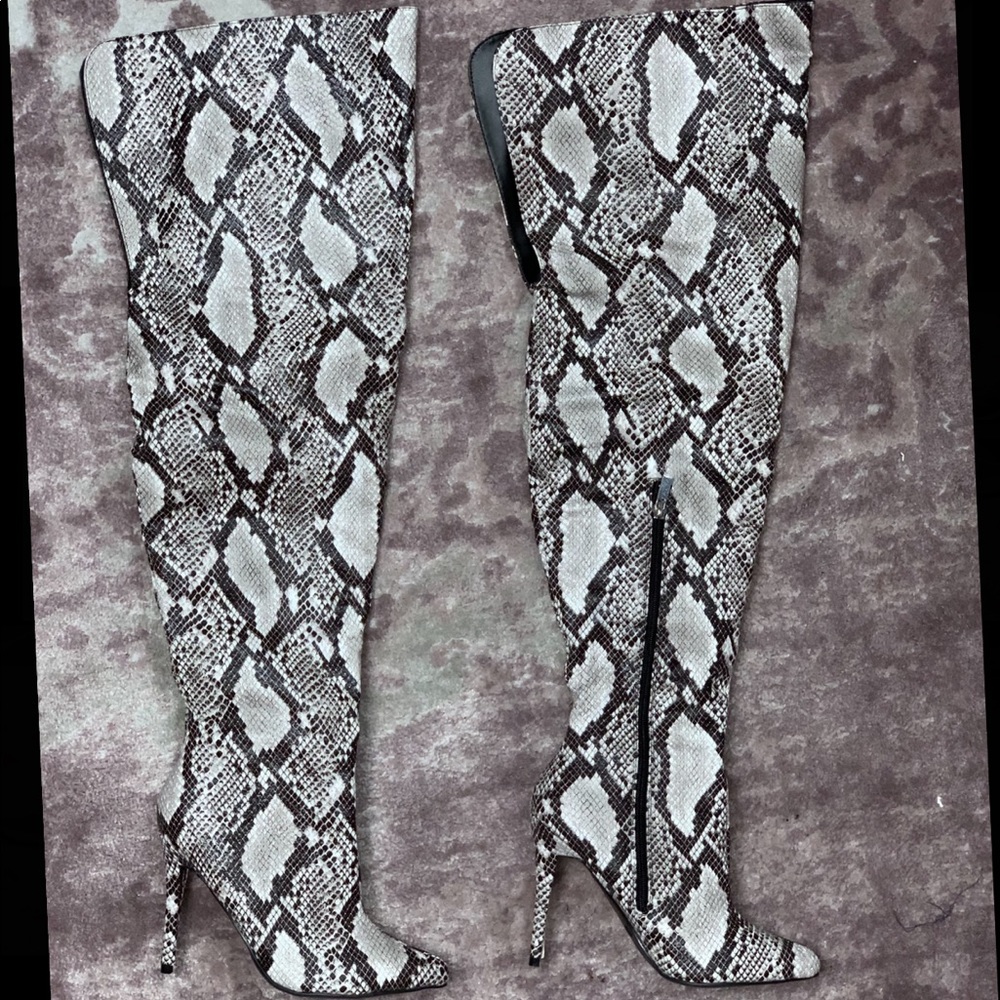 Thigh high snake boots
